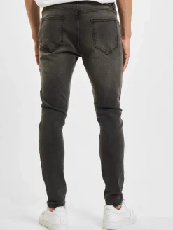 Jeans & Hosen*CRIMINAL DAMAGE Skinny-Jeans in Rip-Waschung, Grau