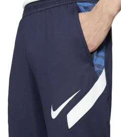 Sportunterbekleidung|Jogginghosen & Fitnessmode*NIKE Strike 21 Herren Trainings-Hose mit DRI-FIT-Technologie leichte Sport-Hose mit Marken-Logo Jogging-Hose mit FLYVENT-Bund Slim Fit CW5862-451 Dunkelblau/Weiß