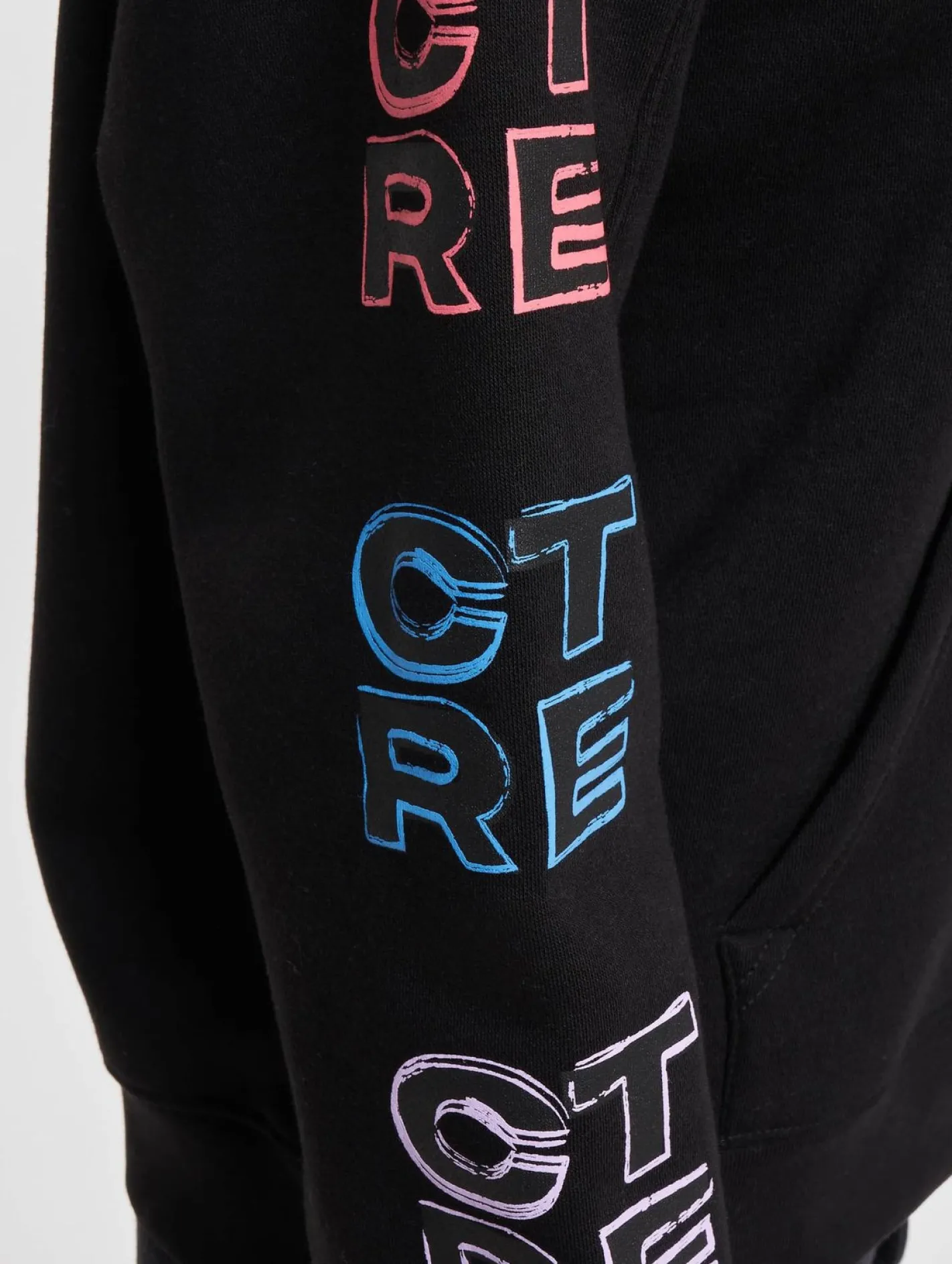 Sweater & Pullover*The Couture Club Oversize-Kapuzenpullover mit mehrfarbiger Grafik in Schwarz