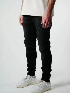 Jeans & Hosen*UNEFFECTED Premium Ripped Slim Fit Jeans schwarz